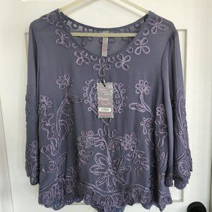 Pretty Angel top with beautiful, decorative cording